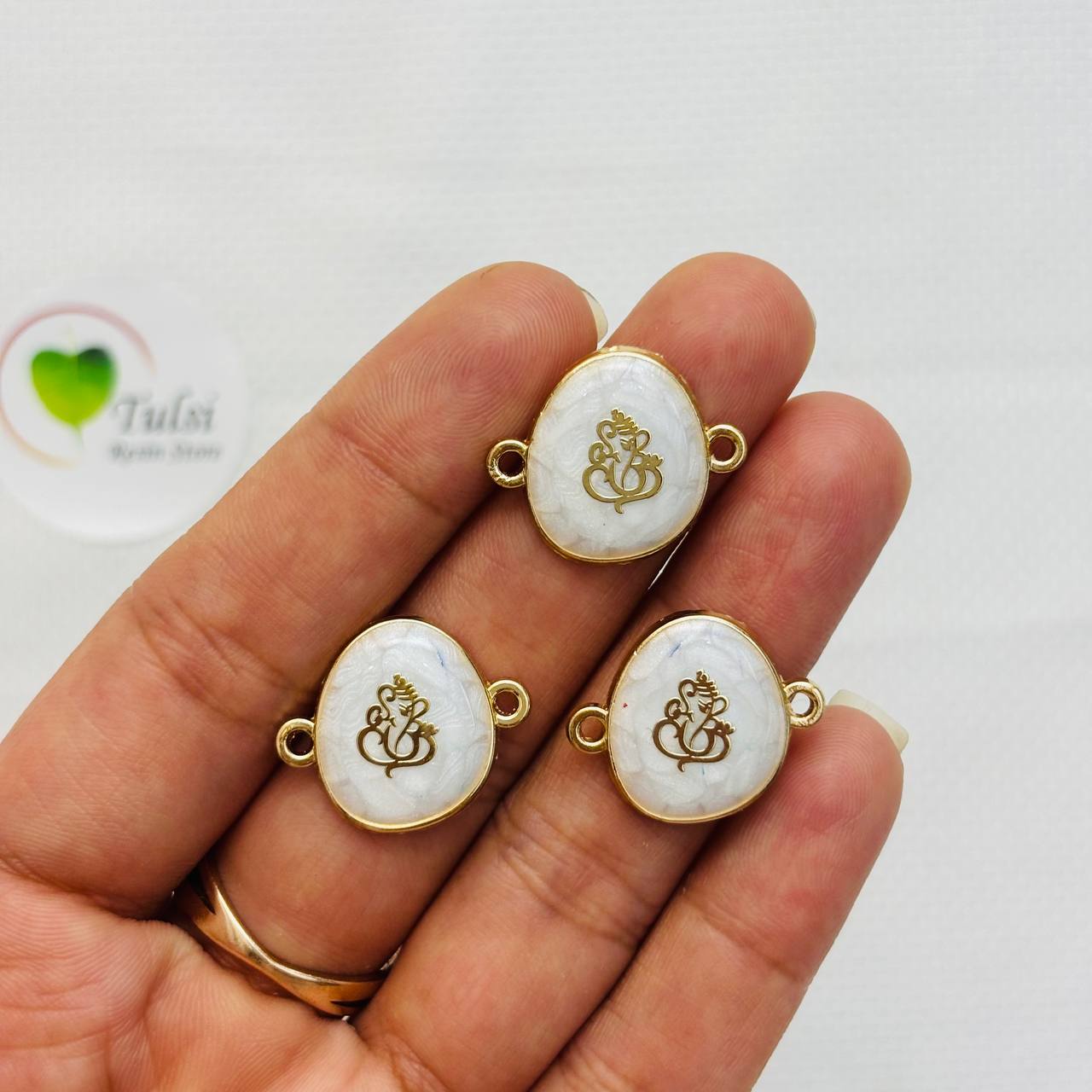 Rakhi Charm (G) Tulsi Resin Store