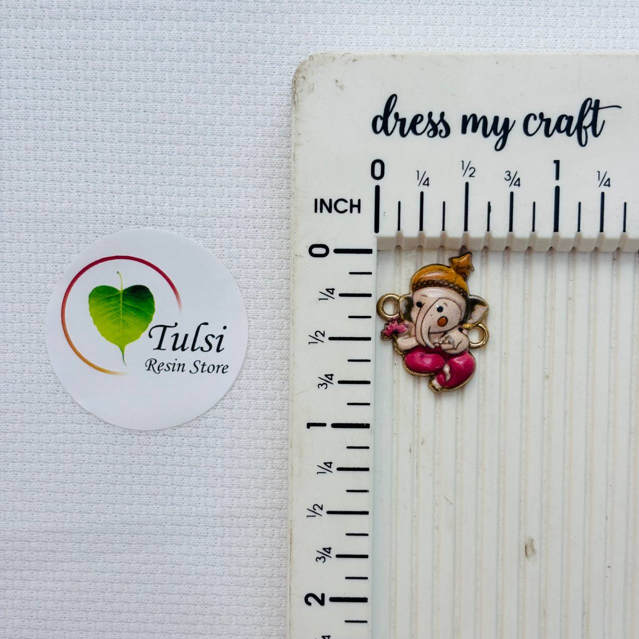 Rakhi Charm (A) Tulsi Resin Store