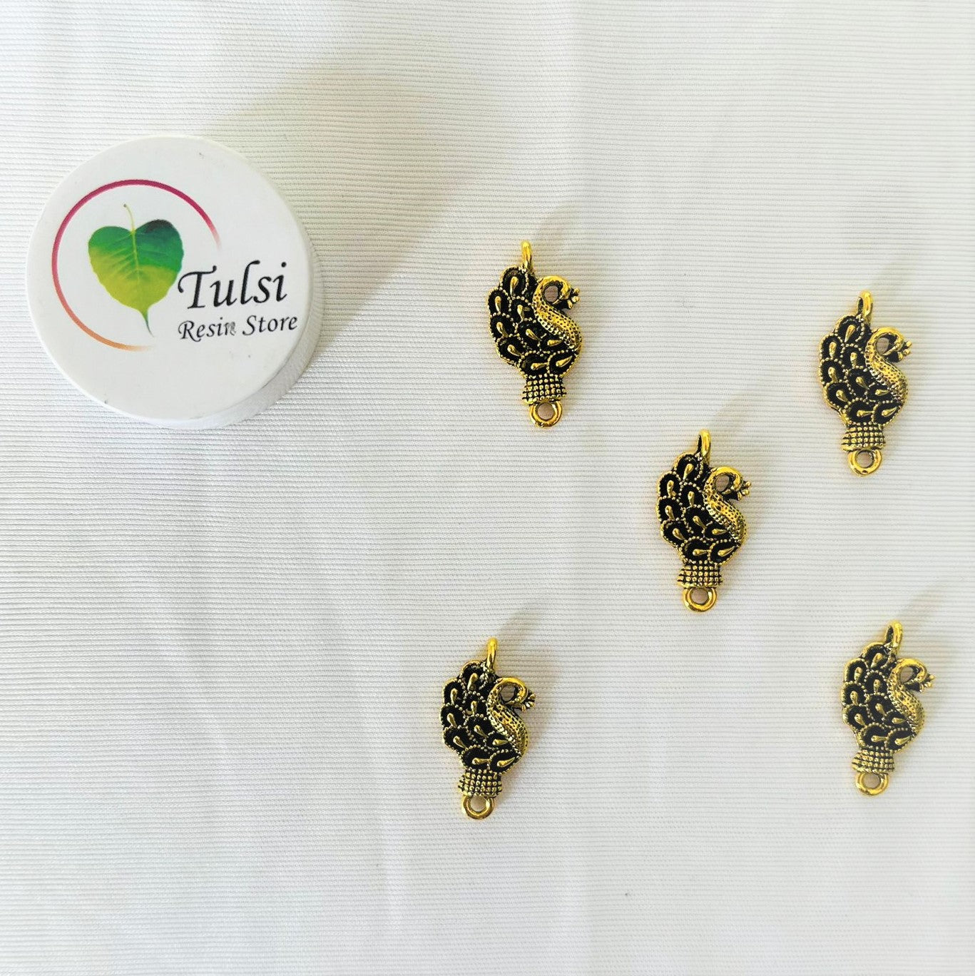Rakhi Charm (M) Tulsi Resin Store
