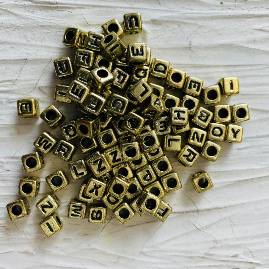 Alphabet Beads Gold tulsiresin